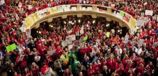 Students and workers fight back against “Walker, Union Buster” in Wisconsin